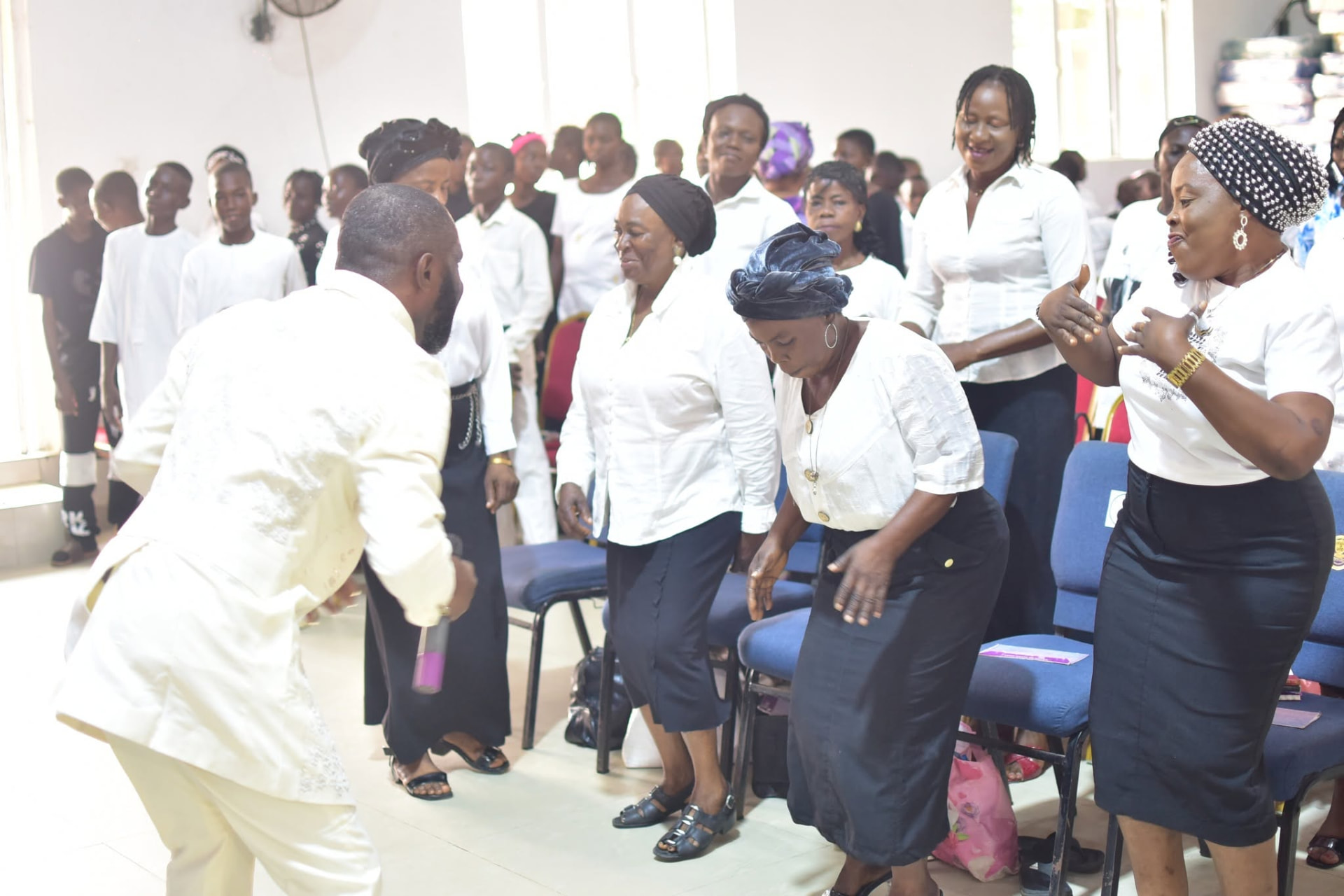 A minister sharing a testimony with the congregation